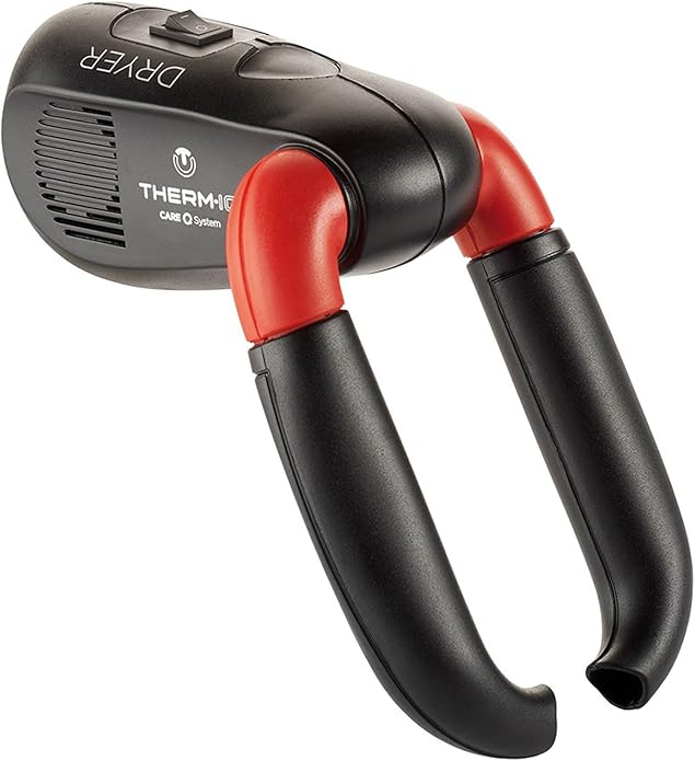 Therm-ic boot dryer with two drying tubes; black housing with red joints and a power switch on top.